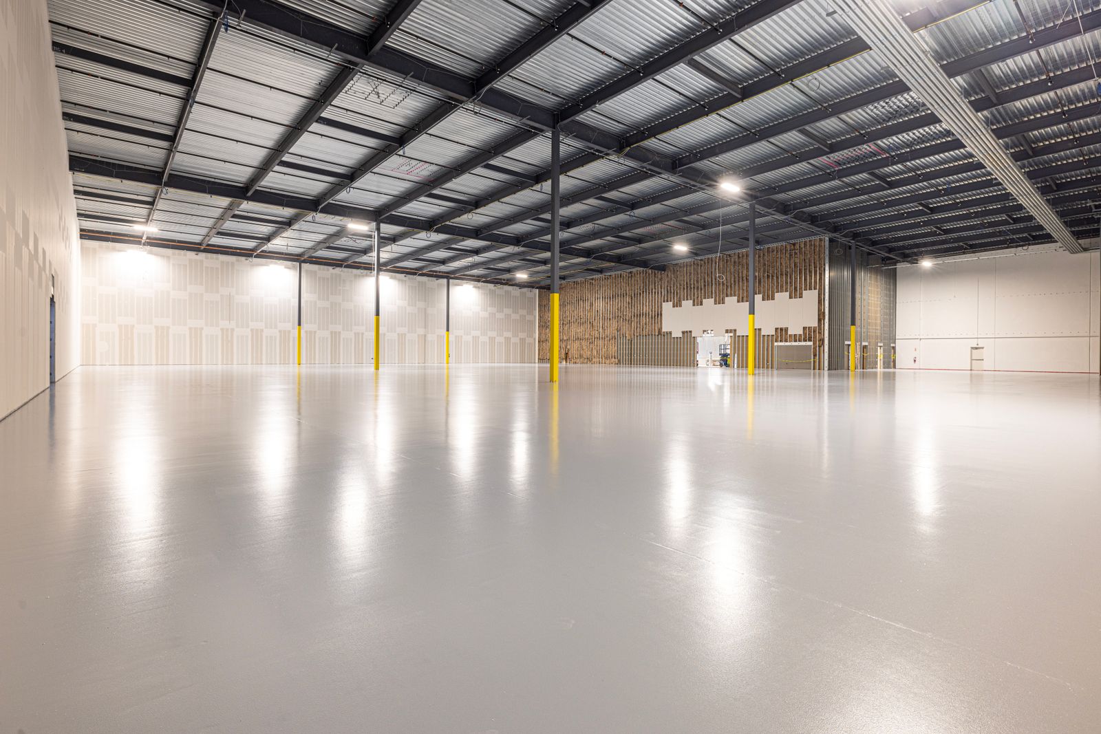 A more efficient facility — illustrative architectural photograph